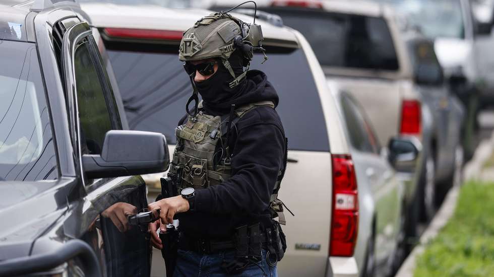 epa12669130 Immigration and Customs Enforcement agents and other law enforcement officials investigate a reported federal agent-involved shooting near the intersection of 126th Street and Mona Boulevard in Willowbrook, California, USA, 21 January 2026. Federal agents with the Department of Homeland Security were conducting an operation in the area when a brief pursuit ended in a crash and shots were fired, authorities said, adding that no one was injured.  EPA/CHRIS TORRES