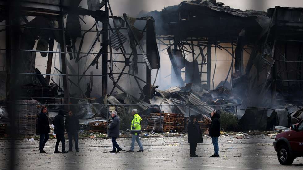 epa12682140 A fire broke out early morning at a biscuit factory in Trikala, Thessaly, Greece, on 26 January 2026. Three people were found dead by firefighters during the extinguishing of the fire, while two are still missing. The fire broke out shortly before 4 am, when, as reported by the Fire Department, there were 13 people inside. Eight people managed to exit. EMAK rescue teams are operating in the area along with 40 firefighters, 13 vehicles, and local administration machinery. According to the police, a large explosion was heard. An investigation is underway.  EPA/STR