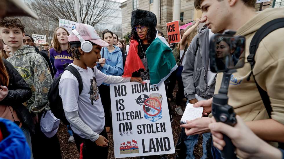 epa12693590 Students from Decatur High School participate in an anti-ICE school walkout and protest rally in Decatur, Georgia, USA, 30 January 2026. Thousands of people took part in the nationwide 'general strike' in the wake of the shooting deaths of Renee Good and Alex Pretti during confrontations with ICE agents in Minneapolis, Minnesota.  EPA/ERIK S. LESSER