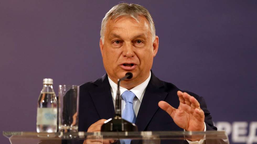 epa09331052 Hungarian Prime Minister Viktor Orban talks during a press conference after a meeting with Serbian President Vucic in Belgrade, Serbia, 08 July 2021. Orban is on an official visit to Serbia.  EPA/ANDREJ CUKIC