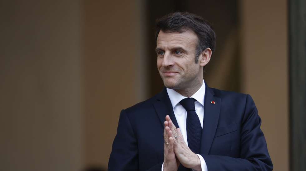 epa10541251 French President Emmanuel Macron gestures as he welcomes Costa Rica President Rodrigo Chaves Robles (not pictured) at the Elysee Palace in Paris, France, 24 March 2023.  EPA/YOAN VALAT