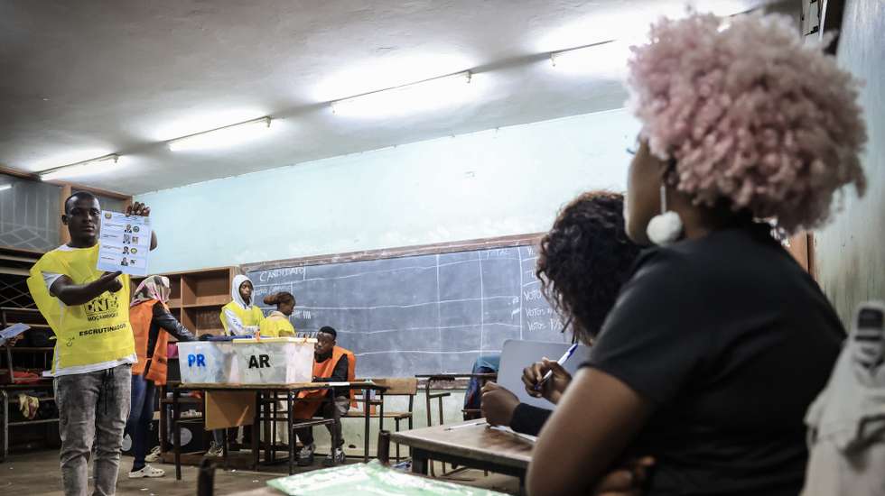 epa11651463 Election officials count votes for the Mozambique general elections at a polling station in Maputo, Mozambique, 09 October 2024. More than 17.1 million Mozambican voters will choose the President of the Republic, provincial assemblies and their governors, and 250 members of the Assembly of the Republic. The National Elections Commission (CNE) approved lists of 35 political parties running for the Assembly of the Republic and 14 political parties and groups of citizen voters for provincial assemblies.  EPA/JOSE COELHO