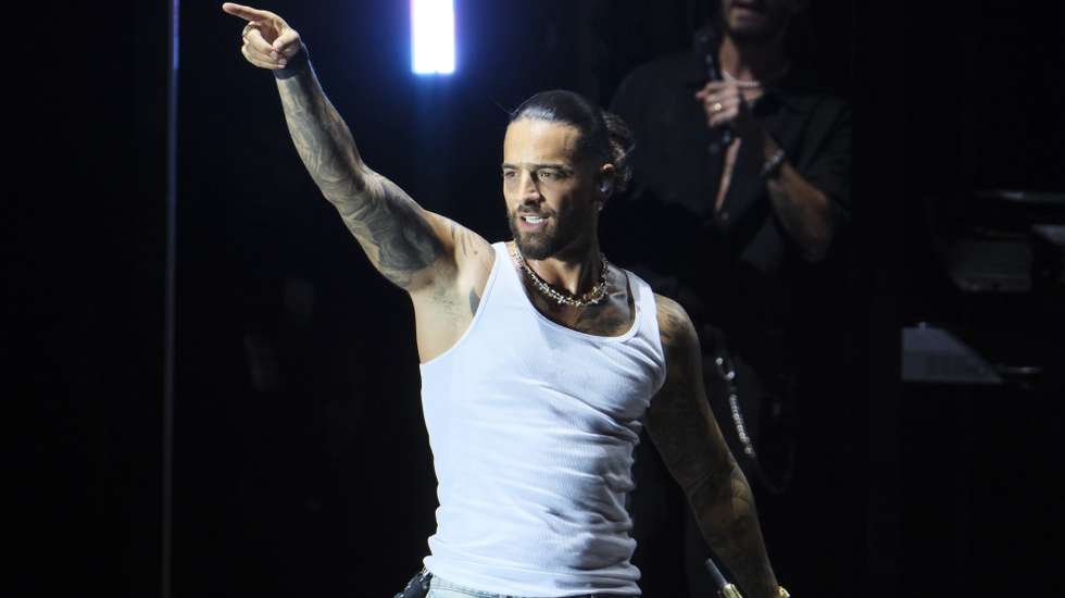 epa11488597 Colombian singer Maluma performs on stage during Cook Music Festival held in Santa Cruz de Tenerife, Canary Islands, Spain, 19 July 2024.  EPA/Alberto Valdes