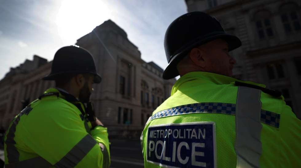 epa11557737 Policemen keep watch in London, Britain, 21 August 2024. According to the a recent study by the Youth Endowment Fund (YEF), 'stop and search' tactics by British police has proved ineffective. The study highlighted stop and search did little to curb rising violence and knife crime. Moreover, black people are four times more likely to be targeted by police for a stop and search than white people, the study said.  EPA/ANDY RAIN