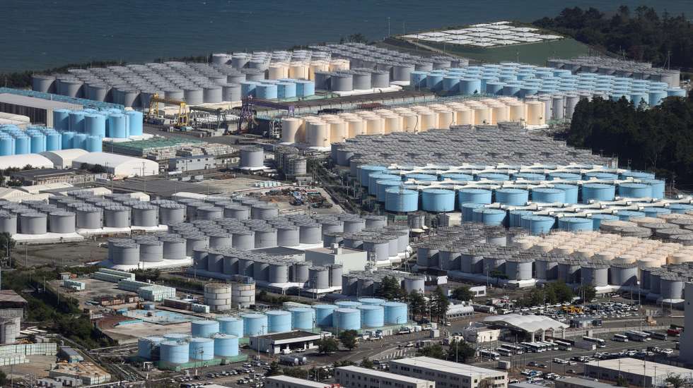 epa10900852 This aerial picture from a Jiji Press charter aircraft shows tanks containing radioactive water at the Fukushima Daiichi nuclear power plant in Okuma, Fukushima Prefecture, Japan, 24 August 2023 (issued 05 October 2023). On 05 October 2023, plant operator Tokyo Electric Power Company Holdings Inc. (TEPCO) started the second offshore discharge of treated radioactive water containing radioactive tritium diluted with a large amount of seawater from the Fukushima nuclear power plant into the Pacific Ocean.  EPA/JIJI PRESS JAPAN OUT EDITORIAL USE ONLY