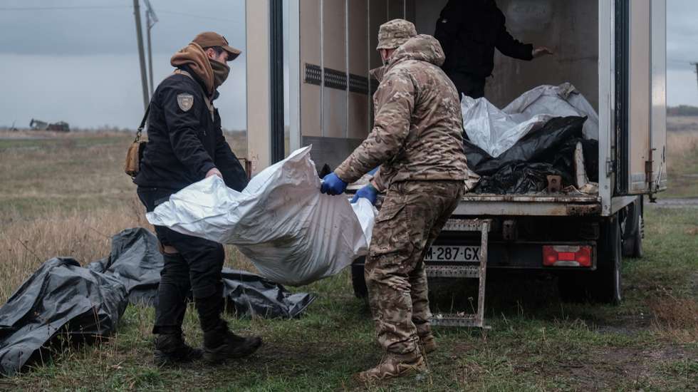 epa12471844 Volunteer members of the Ukrainian recovery group 'Platforma' work to identify the remains of several Russian soldiers killed in combat on the Donbas frontline, Ukraine, 21 October 2025 (issued 22 October 2025). The organization, which works to recover the bodies of both sides, recovered three Russian soldiers and analyzed the skeletal remains of two other individuals.  EPA/MARIA SENOVILLA