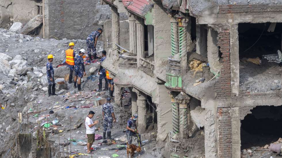 epa13219018 Members of the Nepalese Armed Police Force conduct search and rescue operations in Dhunge, Nuwakot district, Nepal, 07 September 2026. Nepal is observing a national day of mourning on 07 September on the 13th day following devastating flash floods. More than 1,200 people have been killed, and over 4,000 remain missing across northern Nepal after a glacial collapse and avalanche-triggered flash floods and mudslides along the Bhotekoshi and Trishuli river valleys near the Nepal-Tibet border, causing widespread destruction to settlements and infrastructure, according to the National Disaster Risk Reduction and Management Authority (NDRRMA).  EPA/NARENDRA SHRESTHA