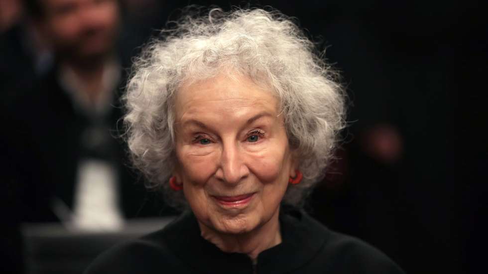 epa09902320 Canadian writer Margaret Atwood smiles during a ceremony in which she was awarded a Honoris Causa title by the University of Porto, at the Rectory of the University, in Porto, Portugal, 22 April 2022. The author of the celebrated novel 'The Handmaid's Tale' is the 100th person distinguished with the title of Doctor Honoris Causa by the University of Porto.  EPA/ESTELA SILVA