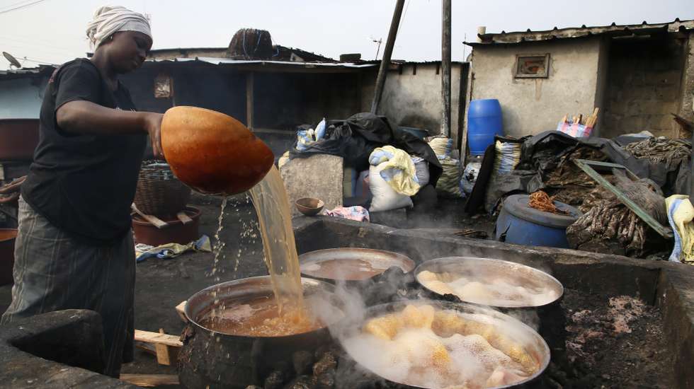 epa10428585 A woman prepares Dolo (African traditional beers brewed with sorghum malt) at a cabaret in Koumassi, a popular district of Abidjan, Ivory Coast, 25 January 2023. The Dolo is an indigenous traditional beer made in West Africa (Cote D'Ivoire, Burkina Faso), from cereals. The Dolo is produced in northern Cote D'Ivoire and southern Burkina Faso. In Cote D'Ivoire it is consumed by the Senoufo, the Lobi and the Koulango Ethnie living in the North. In Cote D'Ivoire, a variant of the Dolo is made with corn and is drunk sugary. It is preserved in canaries, and is drunk in calabashes. The dolo is drunk in 'cabarets' found in markets. It is served in calabashes by the one who makes it, called 'dolotiere', this trade being exclusively feminine. The dolo must be drunk during the day because the fermentation continues. The next day, in general, it becomes too strong. Modernized agro-food production trials in Abidjan have been successful, but consumption remains very minor. The Dolo's price is 0.61 euros (400 FCFA) in Ivory Coast.  EPA/LEGNAN KOULA