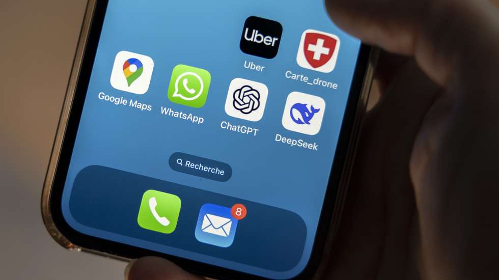 epa11858481 The icon of the US app ChatGPT and the icon of the Chinese app DeepSeek are seen on a mobile phone, in Geneva, Switzerland, 28 January 2025. Shares in major tech firms plummeted following the growing popularity of Deepseek, a Chinese artificial intelligence (AI) app that offers comparable performance at a fraction of the cost of its rivals.  EPA/SALVATORE DI NOLFI