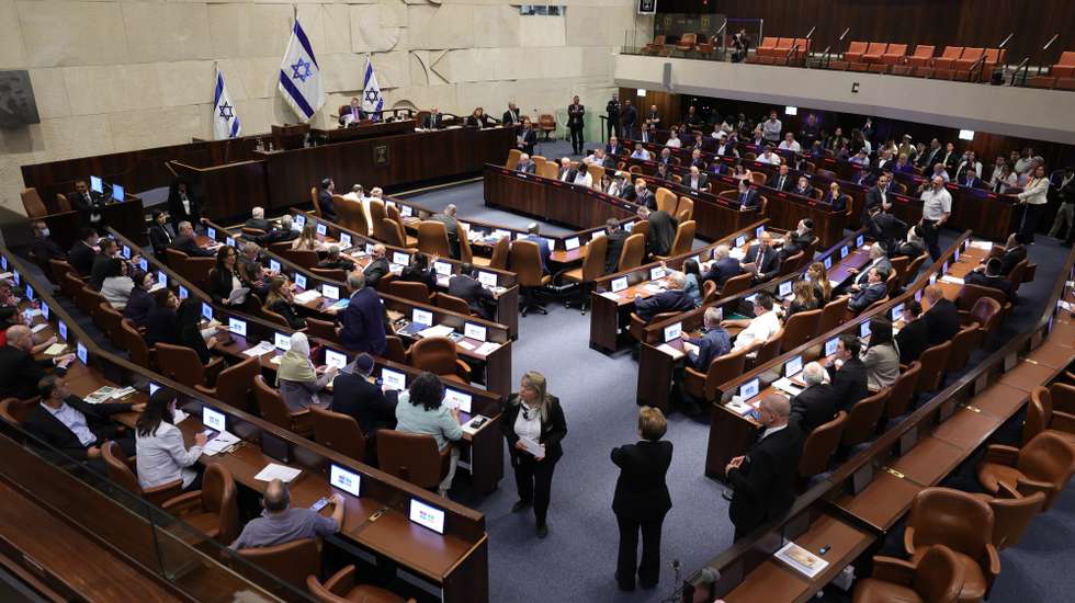 epa13109192 Knesset members vote on the Basic Law proposal, 'Torah Study,' at the Knesset, Israel's parliament, in Jerusalem, 13 July 2026.  EPA/ABIR SULTAN
