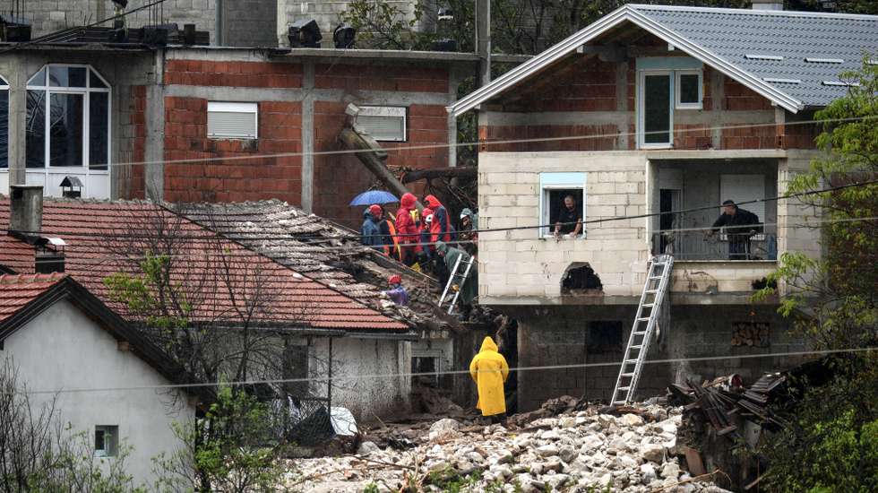 epa11643877 Relief and rescue workers assess the damage brought by the flash floods in the village of Donja Jablanica, Bosnia and Herzegovina, 05 October 2024. Central and southern parts of Bosnia and Herzegovina were hit by a severe rainstorm on 03 October 2024, which caused widespread flooding, closing roads, cutting electricity, and disrupting telecom signals. Rescue services in Jablanica and Kiseljak reported several people missing and called for army assistance, as access to Jablanica was completely blocked due to road and rail closures. 19 fatalities due to the flash floods have been confirmed so far by the regional government of Hercegovacko-Neretvanska county.  EPA/NIDAL SALJIC