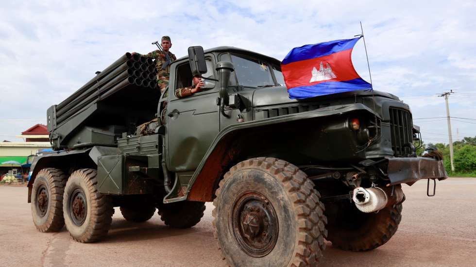 epa12259908 Cambodian soldiers ride on a self-propelled multiple rocket launcher in Oddar Meanchey province, Cambodia, 25 July 2025. Cambodian troops took position near the front line during fighting with Thai forces over a disputed border zone.  EPA/KITH SEREY