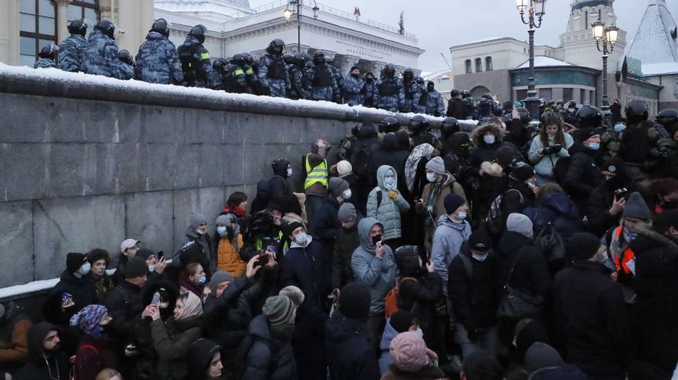 epa08977608 Russian special police units officers during an unauthorized protest in support of Russian opposition leader Alexei Navalny, Moscow, Russia, 31 January 2021. Navalny was detained after his arrival to Moscow from Germany, where he was recovering from a poisoning attack with a nerve agent, on 17 January 2021. A Moscow judge on 18 January ruled that he will remain in custody for 30 days following his airport arrest. Navalny urged Russians to take to the streets to protest. In many Russian cities mass events are prohibited due to an increase in COVID-19 cases.  EPA/SERGEI ILNITSKY