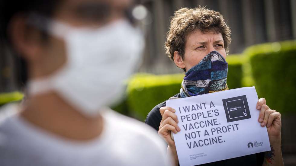 epa09067211 Members of the People's Vaccine Campaign of South Africa (PVC-SA) protest outside the Johnson &amp; Johnson offices in Cape Town, South Africa, 11 March 2021. The People's Vaccine Campaign of South Africa, a coalition of over 150 organisations, protested at Johnson &amp; Johnson calling for them to drop patents and other intellectual property protections to end what they called vaccine apartheid and ensure there is just, fair and equitable access to Covid-19 vaccines. PVC-SA protested in all major cities across South Africa calling their campaign a fight against vaccine imperialism demanding fair pricing and access to vaccines for all.  EPA/NIC BOTHMA