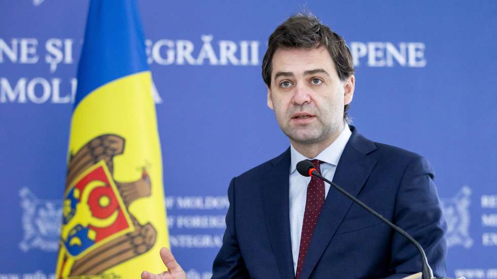 epa09887738 Moldovan Minister of Foreign Affairs and European Integration Nicu Popescu gestures at a joint press conference with Minister of Foreign Affairs, Education and Sport of Liechtenstein at the Ministry of Foreign Affairs in Chisinau, Moldova, 13 April 2022. Dominique Hasler came in Chisinau to support Moldova's effort in accession to the European Union and to aid in the crisis of the refugees of the war in Ukraine.  EPA/DUMITRU DORU