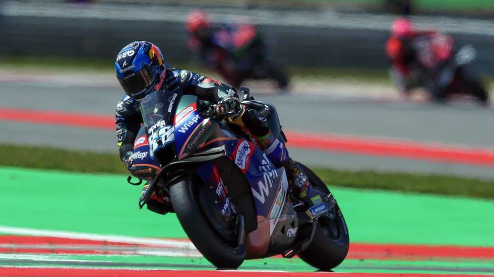 epa10544249 Portuguese MotoGP rider Miguel Oliveira of CryptoDATA RNF MotoGP Team leads the race moments before he crashes during the MotoGP race at the Motorcycling Grand Prix of Portugal at Algarve International race track, Portimao, Portugal, 26 March 2023.  EPA/NUNO VEIGA