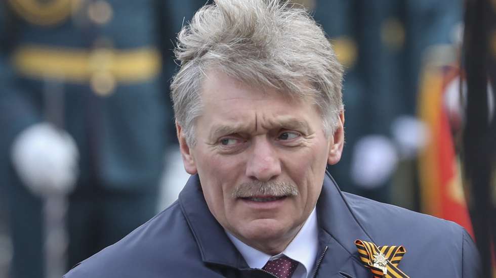 epa09935519 Kremlin spokesman Dmitry Peskov during the Victory Day military parade on the Red Square in Moscow, Russia, 09 May 2022. Russia marks Victory Day, Nazi Germany's unconditional surrender in World War II, with the annual parade in Moscow's Red Square on 09 May, after more than two months of attacks on Ukraine.  EPA/MAXIM SHIPENKOV