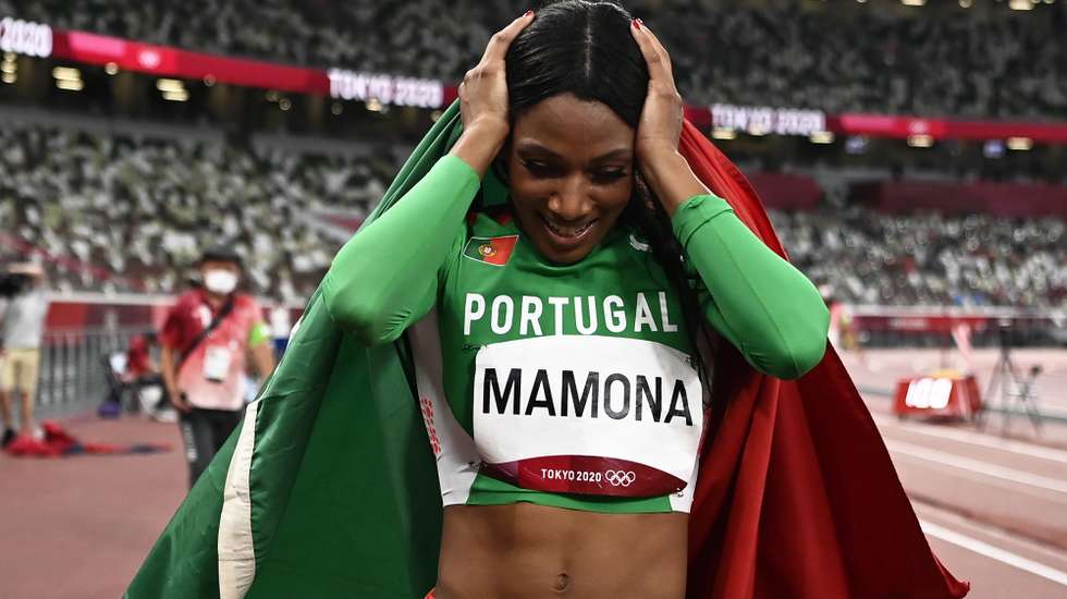 epa09385771 Silver medalist Patricia Mamona of Portugal celebrates after the Women's triple jump final during the Athletics events of the Tokyo 2020 Olympic Games at the Olympic Stadium in Tokyo, Japan, 01 August 2021.  EPA/CHRISTIAN BRUNA