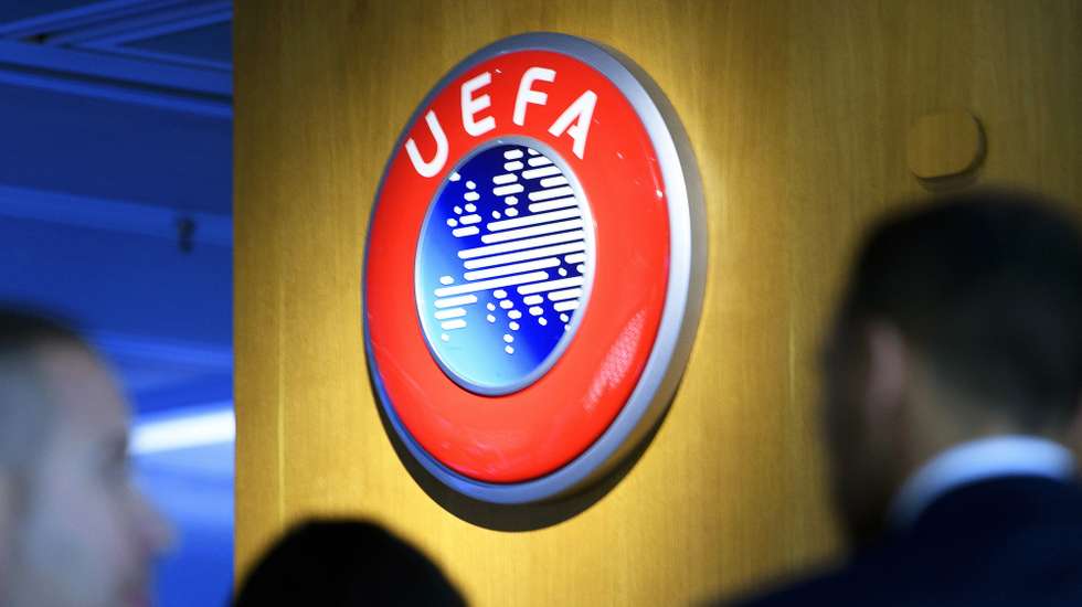 epa08337222 (FILE) - The UEFA logo on display after the meeting of the UEFA Executive Committee at the UEFA headquarters in Nyon, Switzerland, 07 December 2017 (re-issued on 01 April 2020). The UEFA has postponed on 01 April all planned matches of the national team's in June until further notice. The same applies to Champions and Europa League matches of this season.  EPA/LAURENT GILLIERON *** Local Caption *** 55950362