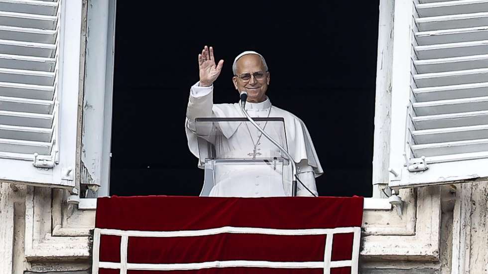 epa12612930 Pope Leo XIV gives the traditional Angelus prayer on the feast of Saint Stephen from his office balcony overlooking St. Peter's Square, in Vatican City, 26 December 2025.  EPA/ANGELO CARCONI