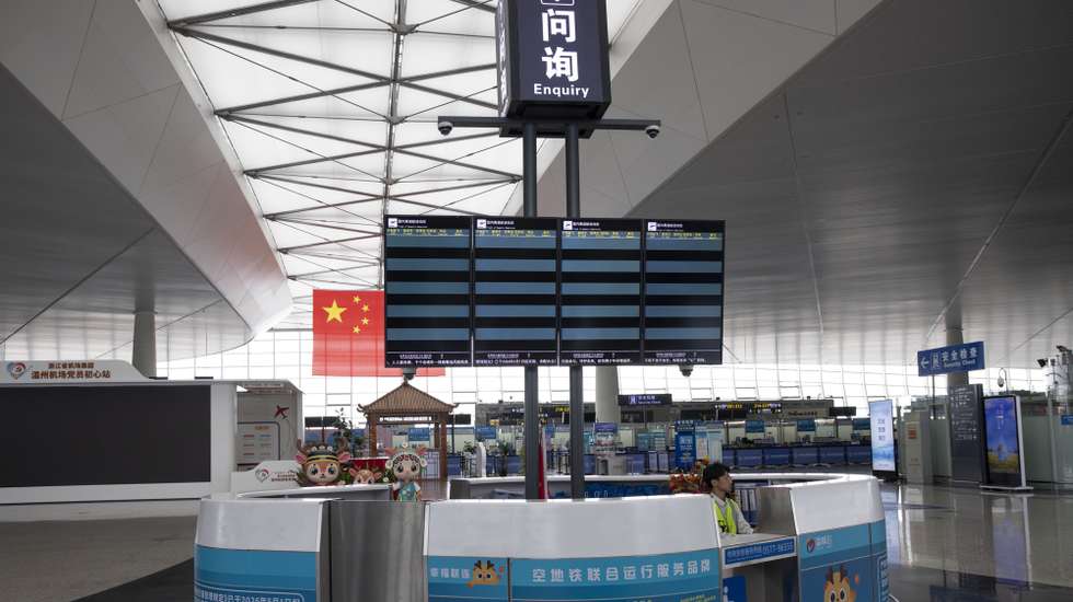 epa13104062 Empty screens, as fligts have been cancelled, are seen at the domestic departures terminal at the airport of Wenzhou ahead of the passage of Typhoon Bavi, in Wenzhou, in the province of Zhejiang, China, 11 July 2026. Typhoon Bavi, the 9th of the season, is expected to make landfall between 11 and 12 July.  EPA/ANDRES MARTINEZ CASARES