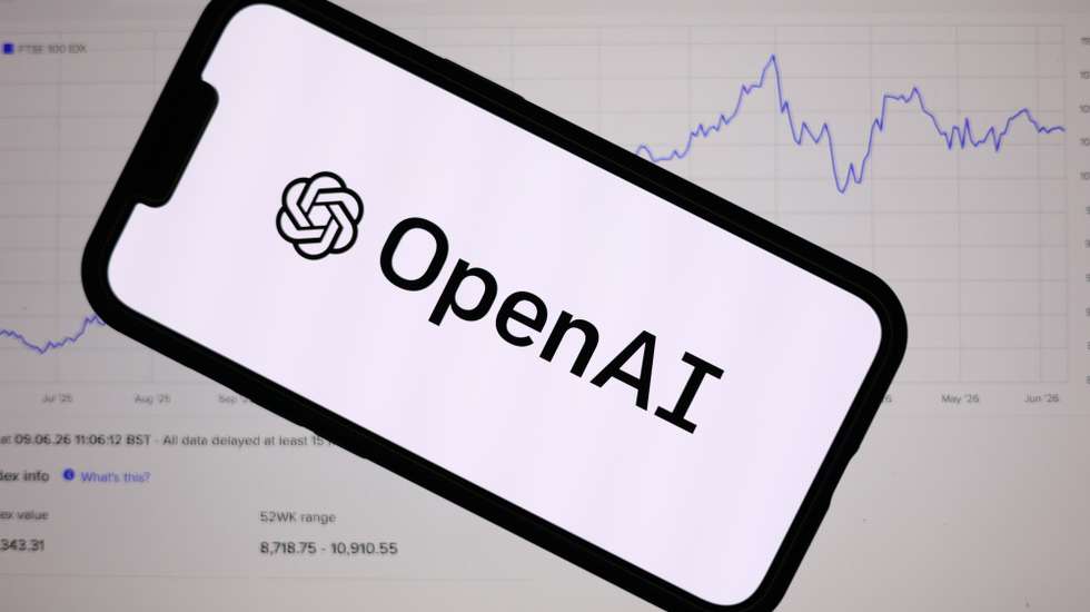 epa13026233 The OpenAI logo is displayed on a mobile phone over a stock market graph displayed on a laptop screen in Liverpool, Britain, 09 June 2026. Leading AI (artificial intelligence) and technology companies Anthropic, OpenAI, and SpaceX are preparing to go public this year at an estimated combined valuation of around four trillion dollars (approximately 3.44 trillion euros).  EPA/ADAM VAUGHAN