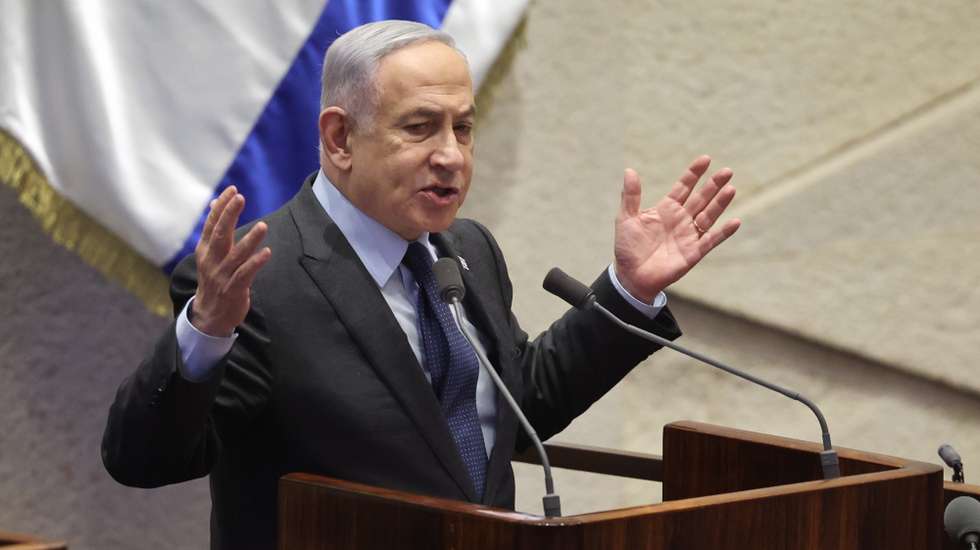 epa11166726 Israeli Prime Minister Benjamin Netanyahu speaks during the voting session for the impeachment of Hadash-Ta’al party MP Ofer Cassif in Jerusalem, 19 February 2024. The motion was brought up after Cassif publicly supported South Africa’s genocide case against Israel at the International Court of Justice (ICJ).  EPA/ABIR SULTAN