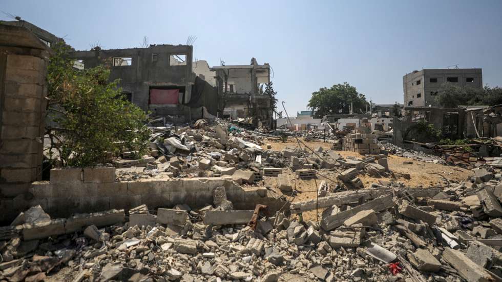 epa11468090 A view of destruction following an Israeli air strike in Al Nuseirat refugee camp, central Gaza Strip, 09 July 2024. More than 16 Palestinians have been killed following Israeli air strikes in Al Nuseirat refugee camp on 09 July, according to the Palestinian Ministry of Health. The Israeli military stated that its troops are continuing 'operational activity' throughout the Gaza Strip. More than 38,000 Palestinians and over 1,455 Israelis have been killed, according to the Palestinian Health Ministry and the IDF, since Hamas militants launched an attack against Israel from the Gaza Strip on 07 October 2023, and the Israeli operations in Gaza and the West Bank which followed it.  EPA/MOHAMMED SABER