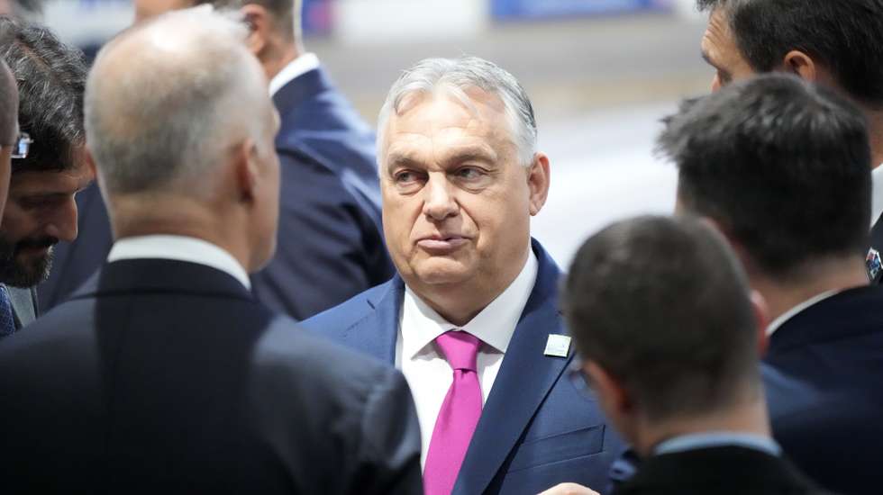 epa11472499 Prime Minister of Hungary Viktor Orban (C) in conversation prior to the beginning of Working Session II of the North Atlantic Treaty Organization (NATO) Summit at the Walter E. Washington Convention Center in Washington, DC, USA, 11 July 2024. The 75th Anniversary NATO Summit takes place in Washington, DC, from 09 to 11 July 2024.  EPA/CHRIS KLEPONIS / POOL