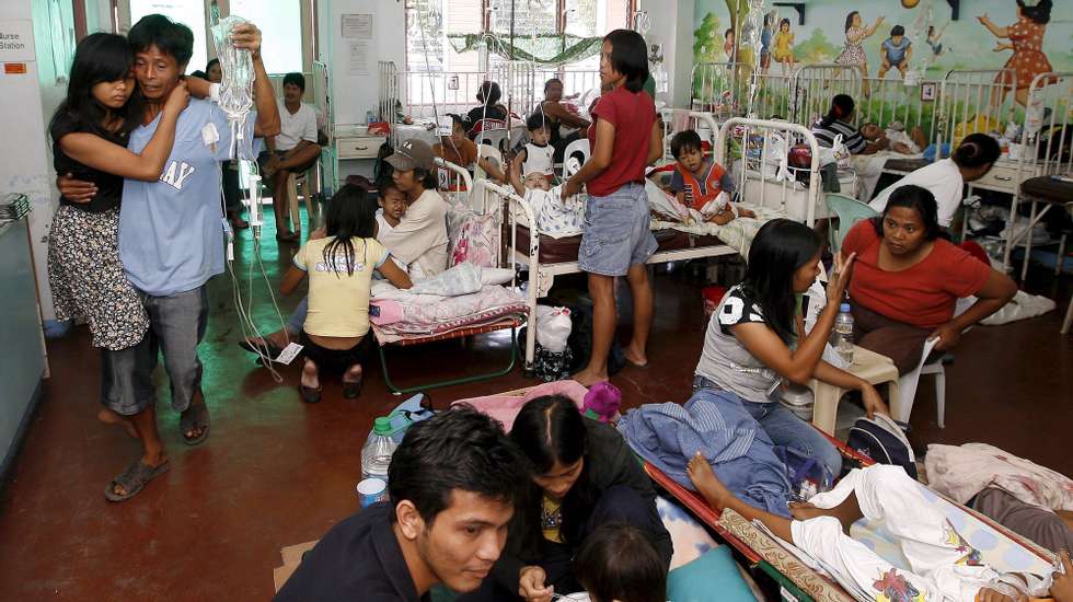 epa01276794 Filipino children confined for typhoid fever at the overcrowded Jose P. Rizal Memorial public hospital in Calamba city, 60 kilometres south of Manila, Philippines, 06 March 2008. A typhoid outbreak has struck a Philippine city south of the capital, afflicting more than 1,200 people, the country&#039;s health chief said. Calamba City was declared in a state of calamity after the outbreak. Most residents suspect that contaminated drinking water was the source of the outbreak, but tests on the local water source was negative for typhoid-causing bacteria.  EPA/DENNIS M. SABANGAN