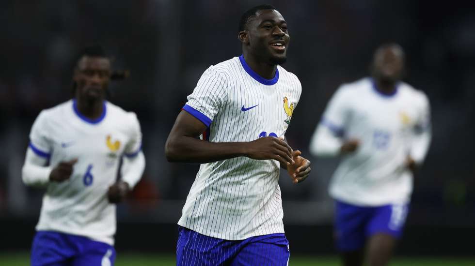 epa11245439 France's Youssouf Fofana celebrates after scoring the 1-1 goal during the friendly international soccer match between Slovenia and Portugal in Ljubljana, Slovenia, 26 March 2024.  EPA/ANTONIO BAT