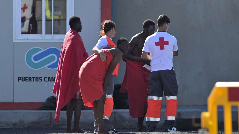 epa11685620 Rescued migrants are assisted by officials and Red Cross team in El Pinar, on the island of El Hierro, Spain, 26 October 2024. The 175 migrants rescued by the Maritime Rescue vessel, Salvamar Adhara, in waters near El Hierro, are transferred to the port of La Restinga, to be treated by the emergency teams.  EPA/GELMERT FINOL