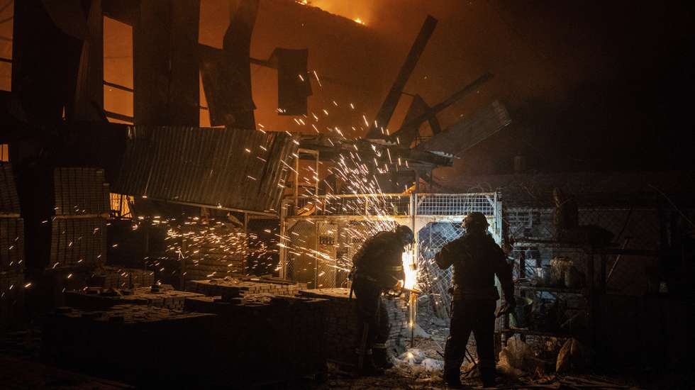 epa12752497 Ukrainian firefighters work at the site of a recent Russian airstrike on a warehouse in Sloviansk, Ukraine, 17 February 2026 (issued 18 February 2026), amid the ongoing Russian invasion. According to Vadym Filashkin, Governor of Donetsk Oblast, the morning Russian airstrike on Sloviansk killed at least 2 people and wounded more than a dozen. The attack also damaged 14 private houses, 2 high-rise buildings, warehouses, an administrative building, and other infrastructure.  EPA/TOMMASO FUMAGALLI