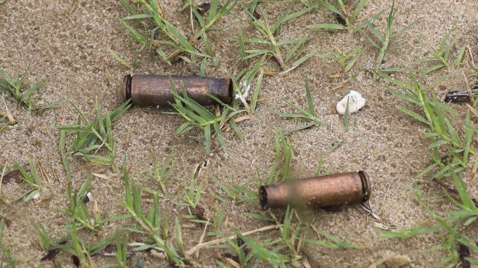 epa09131133 Spent AK rifle capsules in the street of Palma, Cabo Delgado, Mozambique, 12 April 2021. The violence unleashed more than three years ago in Cabo Delgado province escalated again about two weeks ago, when armed groups first attacked the town of Palma.  EPA/JOAO RELVAS