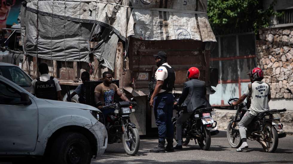 epa10777781 Members of the Haitian Armed Forces carry out a security operation in Port-au-Prince, Haiti 30 July 2023. Nearly ten months after Haitian Prime Minister Ariel Henry called for a multinational force, Kenyan Foreign Minister Geoffrey Onyeama on 29 July has announced Kenya's willingness to lead that mission and deploy 1,000 police officers to the Caribbean country in an attempt to help to end a multidimensional crisis and extreme violence that have been bleeding the population for a long time.  EPA/JOHNSON SABIN