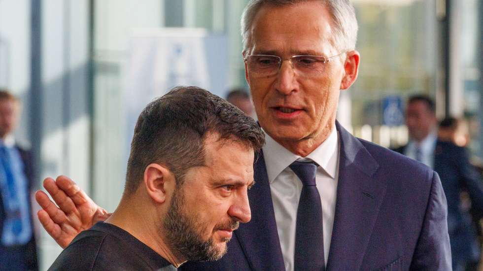 epa10912580 NATO Secretary General Jens Stoltenberg (R) and Ukraine's President Volodymyr Zelensky hold a joint doorstep statement ahead of a two-day NATO Defense Ministers Council at the Alliance headquarters in Brussels, Belgium, 11 October 2023.  EPA/OLIVIER MATTHYS