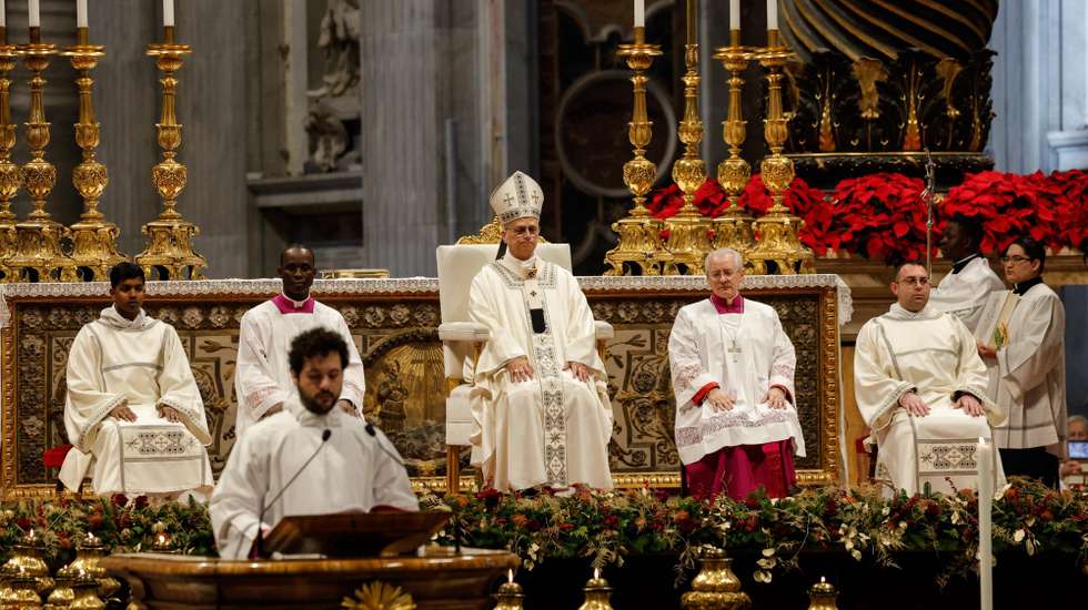 epa12620312 Pope Leo XIV (C) presides over the New Year's Day Mass in St. Peter's Basilica, Vatican City, 01 January 2026.  EPA/GIUSEPPE LAMI