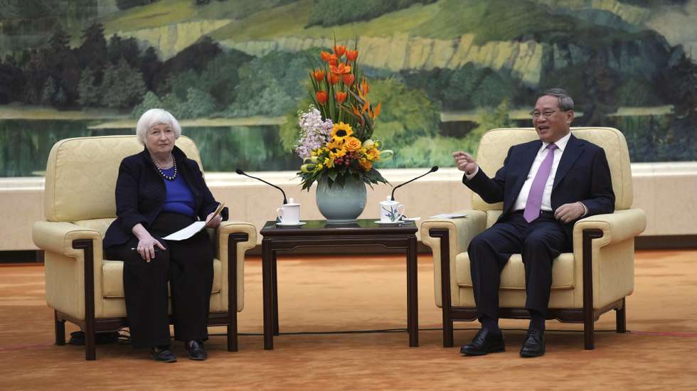 epa11263409 U.S. Treasury Secretary Janet Yellen (L) meets with Chinese Premier Li Qiang at the Great Hall of the People in Beijing, China, 07 April  2024. Yellen, who arrived in Beijing after starting her five-day visit in Guangdong province, one of China's major industrial and export hubs, said that talks will create a structure to hear each other's views and try to address American concerns about manufacturing overcapacity in China.  EPA/Tatan Syuflana / POOL