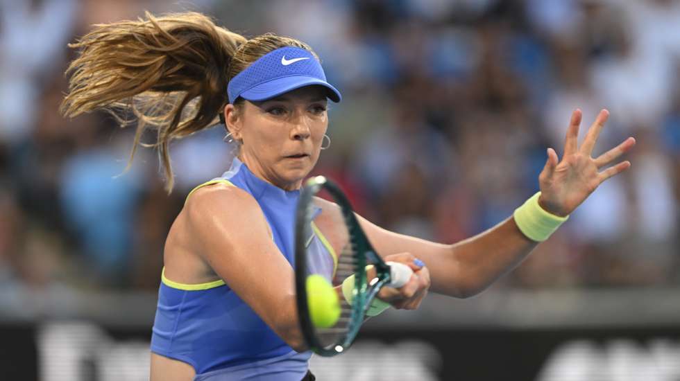 epa12663297 Katie Boulter of Britain in action during her Women’s Singles first round match against Belinda Bencic of Switzerland at the Australian Open tennnis tournament in Melbourne, Australia, 20 January 2026.  EPA/LUKAS COCH  AUSTRALIA AND NEW ZEALAND OUT