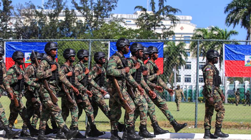 epa12972389 Members of the Haitian Armed Forces (FAd'H) participate in a ceremony marking the 223rd anniversary of Flag Day at the National Palace gardens in Port-au-Prince, Haiti, 18 May 2026.  EPA/Mentor David Lorens