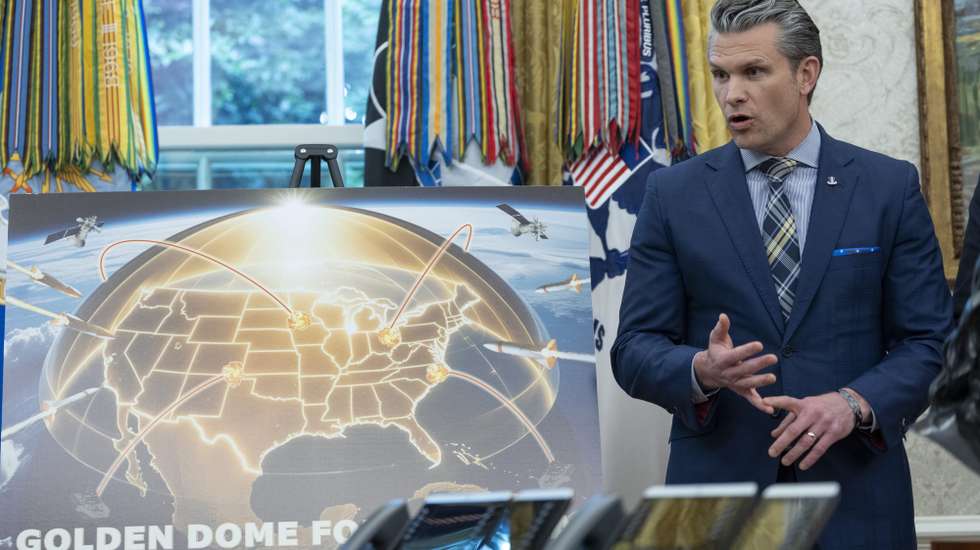 epa12120838 US Secretary of Defense Pete Hegseth participates in an announcement by US President Donald J Trump about moving forward with the Golden Dome missile defense shield, in the Oval Office of the White House in Washington, DC, USA, 20 May 2025.  EPA/CHRIS KLEPONIS / POOL