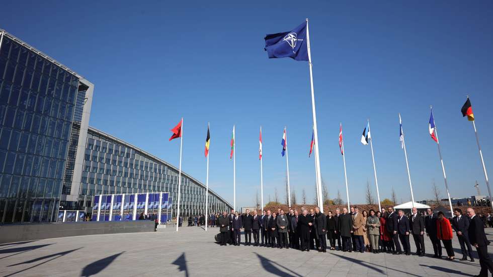 epa10558259 Officials attend a flag-raising ceremony for Finland's accession during NATO foreign ministers' meeting at the Alliance's headquarters in Brussels, Belgium, 04 April 2023. Finland becomes the 31st member of the Alliance on 04 April.  EPA/OLIVIER MATTHYS / POOL