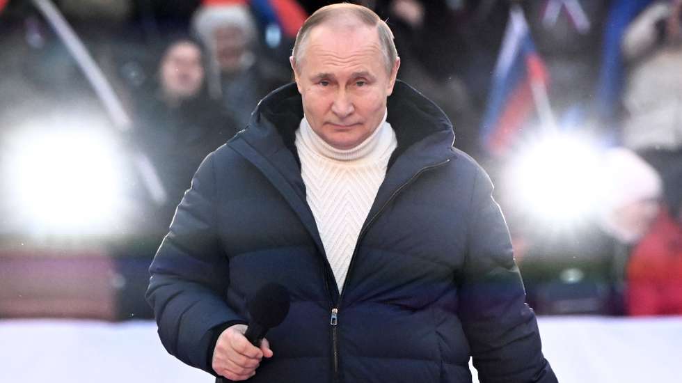 epa09833831 Russian President Vladimir Putin attends a concert marking the 8th anniversary of Crimea's reunification with Russia at the Luzhniki stadium in Moscow, Russia, 18 March 2022.  Russia in 2014 annexed the Black Sea peninsula, shortly after Crimeans voted in a disputed referendum to secede from Ukraine.  EPA/SERGEI GUNEYEV / SPUTNIK POOL MANDATORY CREDIT