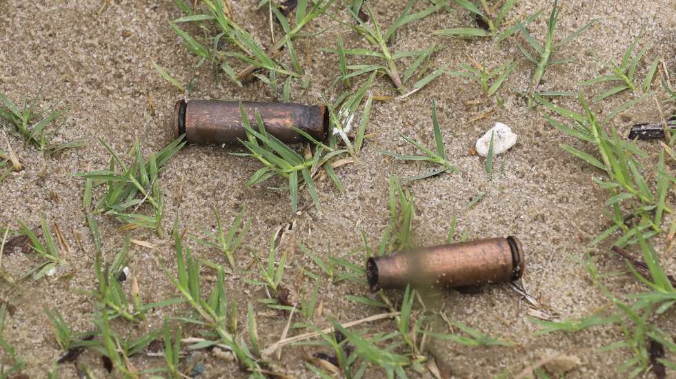 epa09131133 Spent AK rifle capsules in the street of Palma, Cabo Delgado, Mozambique, 12 April 2021. The violence unleashed more than three years ago in Cabo Delgado province escalated again about two weeks ago, when armed groups first attacked the town of Palma.  EPA/JOAO RELVAS