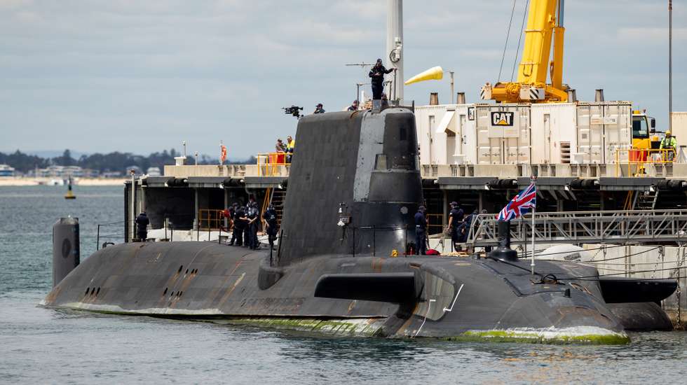 epa09551662 A view of the UK nuclear-powered attack submarine HMS Astute at HMAS Stirling Royal Australian Navy base in Perth, Western Australia, Australia, 29 October 2021. Australia is committed to getting its first nuclear-powered submarines built and operating as quickly as possible, said Defence Minister Peter Dutton. In September 2021, Australia, the United Kingdom (UK) and the United States of America (USA) announced an enhanced trilateral security partnership called AUKUS, under which Australia will acquire a number of nuclear-powered submarines.  EPA/RICHARD WAINWRIGHT AUSTRALIA AND NEW ZEALAND OUT