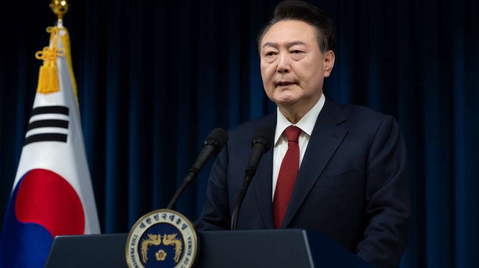 epa11761476 A handout photo made available by the South Korean Presidential Office shows President Yoon Suk Yeol addressing the nation at the Presidential office in Seoul, South Korea, 07 December 2024. Yoon Suk Yeol apologised to the nation in a short televised address ahead of a vote on his impeachment in the National Assembly on 07 December. He faces an impeachment motion from opposition lawmakers after he declared and then reversed martial law, citing the need to root out pro-North Korean forces and uphold the constitutional order.  EPA/South Korean Presidential Office HANDOUT, EDITORIAL USE ONLY, NO SALESHANDOUT EDITORIAL USE ONLY/NO SALES