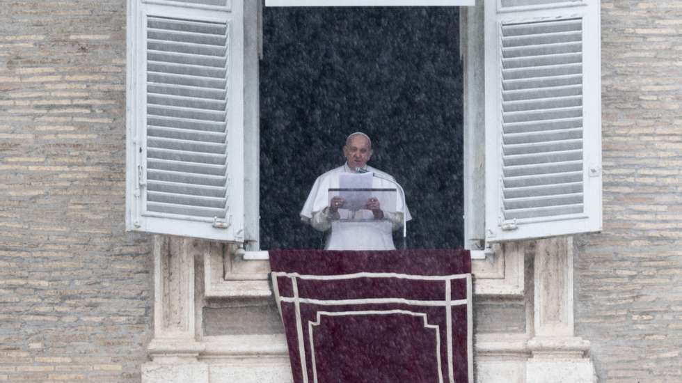 epa08993580 Pope Francis leads his Sunday Angelus Prayer from his window overlooking Saint Peter&#039;s Square at the Vatican, 07 February 2021.  EPA/CLAUDIO PERI