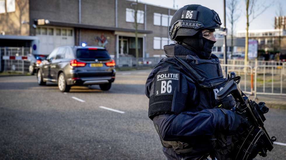 epa11183846 A secured car arrives at the extra-secure court for the verdict in the Marengo criminal case, Amsterdam, Netherlands, 27 February 2024. The court has set 27 February to deliver the verdict in the case that lasted for nearly six years and included charges of multiple assassinations and attempted homicides. A total of seventeen suspects are on trial. A life sentence has been demanded against main suspect Ridouan Taghi and five other suspects.  EPA/ROBIN UTRECHT