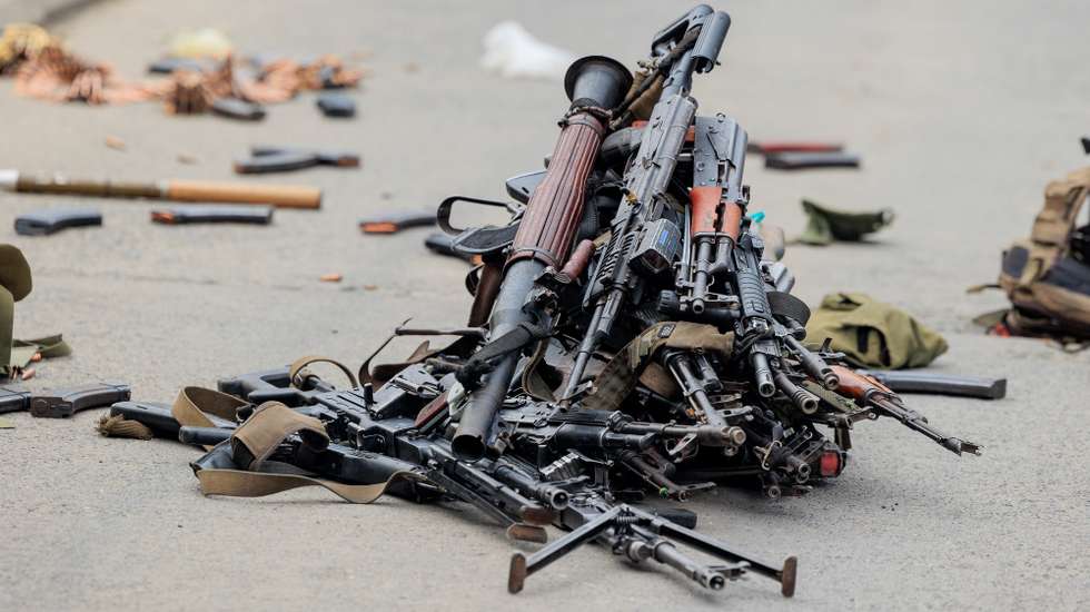 epa11856259 Weapons lie on the ground, taken from surrendering members of the Armed Forces of the Democratic Republic of the Congo (FARDC) after crossing the border from Goma, in the Democratic Republic of the Congo, to Gisenyi, Rwanda, 27 January 2025. Refugees have been crossing into Rwanda in search of safety as soldiers of the Armed Forces of the Democratic Republic of the Congo (FARDC) and M23 rebels continue to fight in the city of Goma. According to the UN Refugee Agency (UNHCR), violence in the eastern Democratic Republic of the Congo (DRC) has displaced 237,000 people in 2025.  EPA/MOISE NIYONZIMA